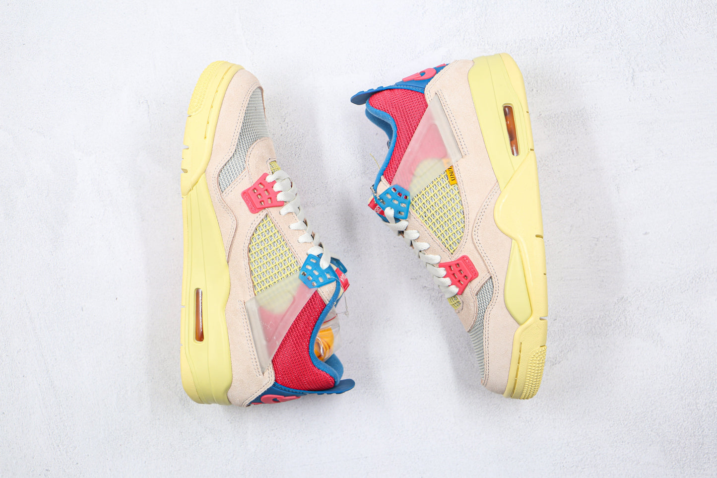 Jordan 4 Retro Union Guava Ice 